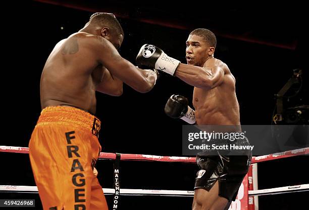 Anthony Joshua in action with Michael Sprott during their Eliminator for the British Heavyweight Championship at Liverpool Echo Arena on November 22,...