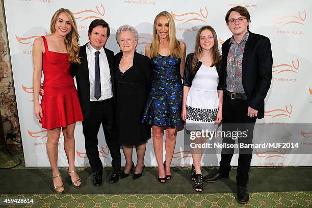 Aquinnah Fox, Michael J. Fox, Phyllis Piper Fox, Tracy Pollan, Esme Fox, and Sam Michael Fox attend 2014 A Funny Thing Happened On The Way To Cure...