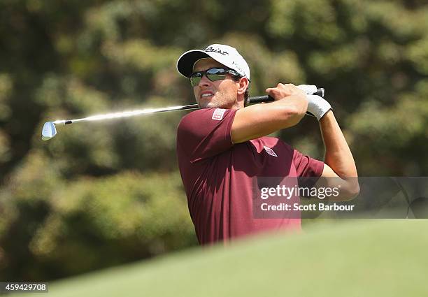 Adam Scott of Australia plays a shot on the 1st hole during day four of the Australian Masters at The Metropolitan Golf Course on November 23, 2014...