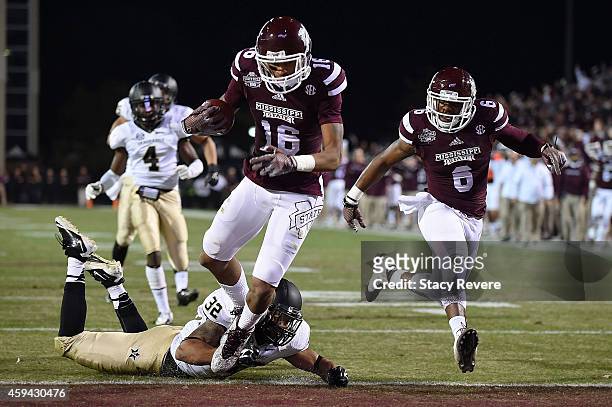 Joe Morrow of the Mississippi State Bulldogs scores a touchdown over Andrew Williamson of the Vanderbilt Commodores during the first quarter of a...