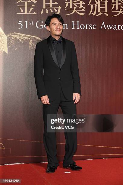 Actor Chang Chen walks on the red carpet of the 51st Golden Horse Awards at Sun Yat-sen Memorial Hall on November 22, 2014 in Taipei, Taiwan of China.