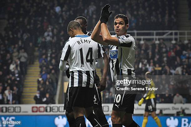 Hatem Ben Arfa of Newcastle claps the fans after Loic Remy scored their third goal during the Barclays Premier League match between Newcastle United...