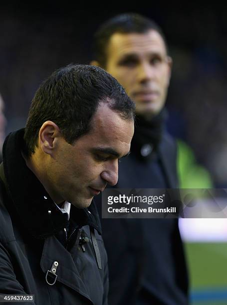Everton manager Roberto Martinez deep in thought as Sunderland manager Gus Poyet looks on during the Barclays Premier League match between Everton...