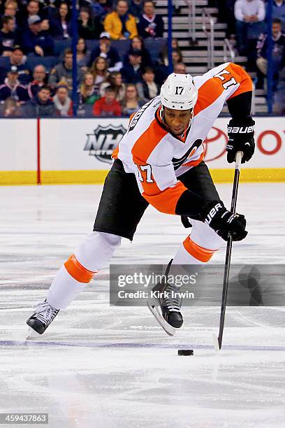 Wayne Simmonds of the Philadelphia Flyers controls the puck during the game against the Columbus Blue Jackets on December 21, 2013 at Nationwide...