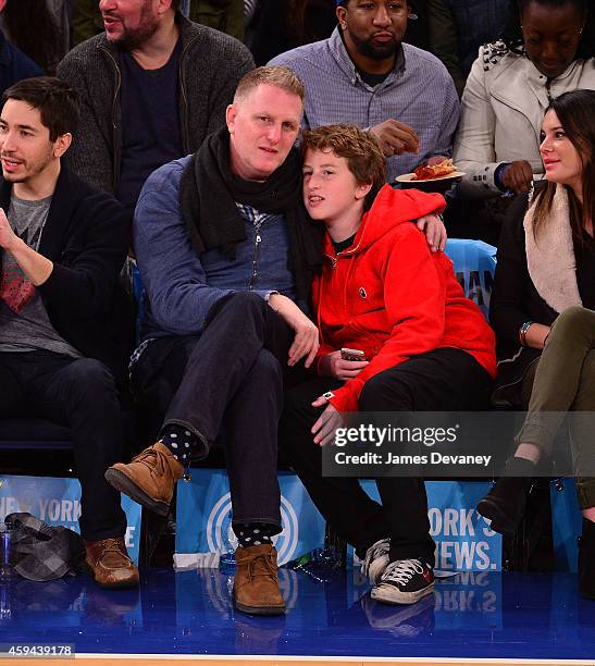 Michael Rapaport and son attend the Philadelphia 76ers vs New York Knicks game at Madison Square Garden on November 22, 2014 in New York City.