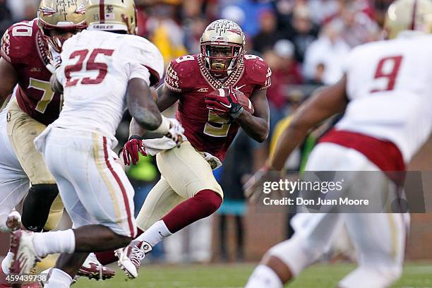 Runningback Karlos Williams of the Florida State Seminoles on a running play during the game against the Boston College Eagles at Doak Campbell...