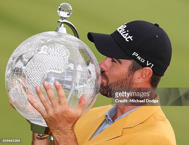 Nick Cullen of Australia kisses the trophy after winning during day four of the Australian Masters at The Metropolitan Golf Course on November 23,...