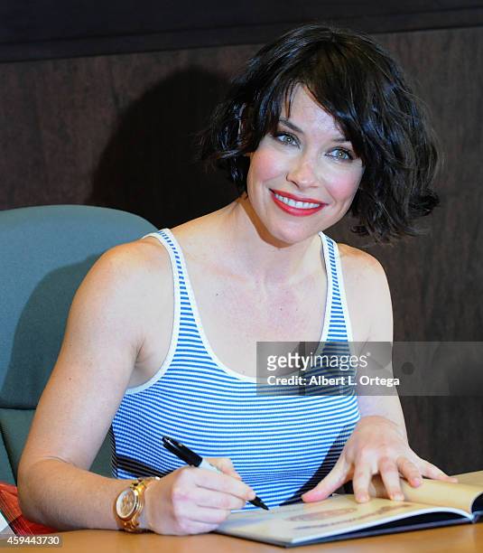 Actress/author Evangeline Lilly signs "The Squickerwonkers" held at Barnes & Noble bookstore at The Grove on November 22, 2014 in Los Angeles,...