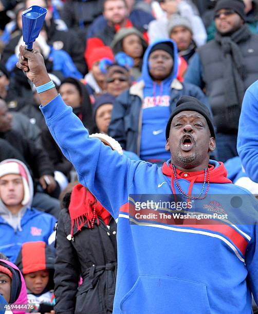 DeMatha fan looked to rally the team just before half-time against Good Counsel in the Washington Catholic Athletic Conference football championship...