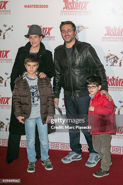 Director Olivier Nakache and wife attend the 'Asterix: Le Domaine des Dieux' Premiere at Le Grand Rex on November 23, 2014 in Paris, France.