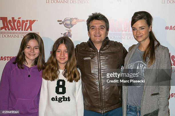 Guests, producer Thomas Langmann and wife Celine Bosquet attend the 'Asterix: Le Domaine des Dieux' Premiere at Le Grand Rex on November 23, 2014 in...