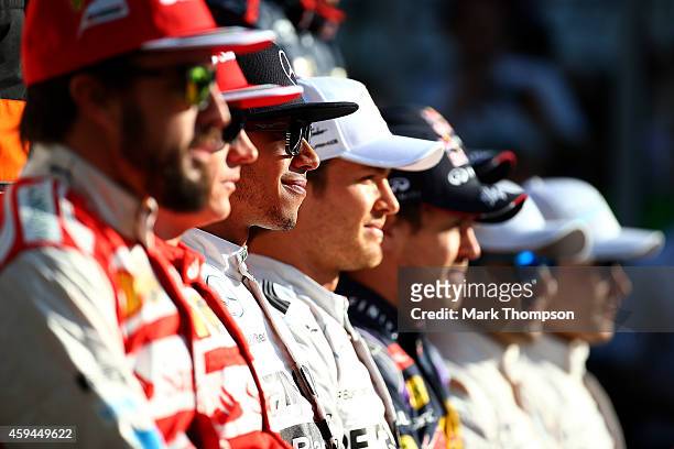 Fernando Alonso of Spain and Ferrari, Kimi Raikkonen of Finland and Ferrari, Lewis Hamilton of Great Britain and Mercedes GP, Nico Rosberg of Germany...