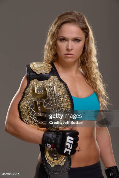 Women's Bantamweight Champion Ronda Rousey poses for a portrait during a UFC photo session on December 26, 2013 in Las Vegas, Nevada.