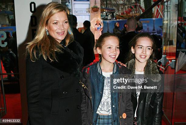 Kate Moss, daughter Lila Grace Moss and guest attend the World Premiere of "Paddington" at Odeon Leicester Square on November 23, 2014 in London,...
