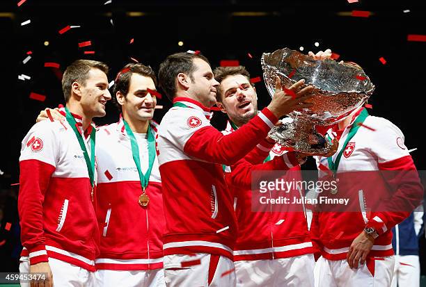 Roger Federer of Switzerland, Stanislas Wawrinka of Switzerland , Marco Chiudinelli of Switzerland, Michael Lammer of Switzerland and Captain Severin...