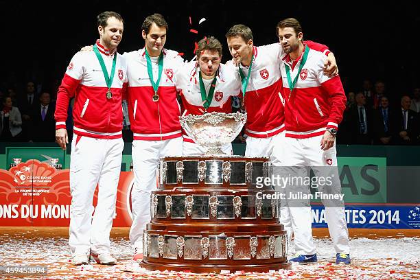 Roger Federer of Switzerland, Stanislas Wawrinka of Switzerland , Marco Chiudinelli of Switzerland, Michael Lammer of Switzerland and Captain Severin...