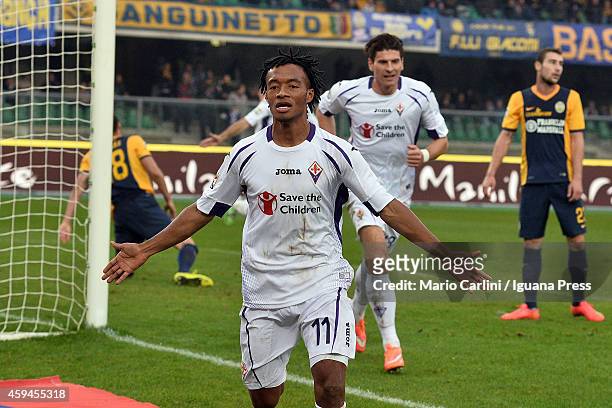 Guillermo Cuadrado of ACF Fiorentina celebrates after scoring his team's second goal during the Serie A match between Hellas Verona FC and ACF...