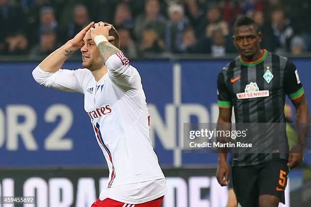 Pierre-Michel Lasogga of Hamburg reacts whilst Assan Lukimya of Bremen looks on during the Bundesliga match between Hamburger SV and SV Werder Bremen...