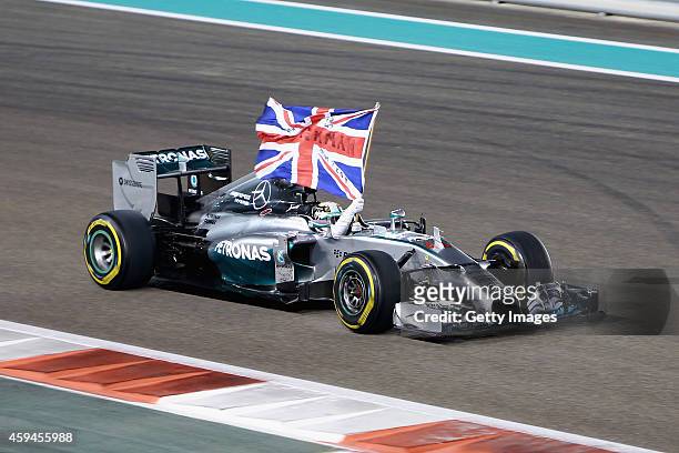 Lewis Hamilton of Great Britain and Mercedes GP celebrates in the car after winning the World Championship and the Abu Dhabi Formula One Grand Prix...