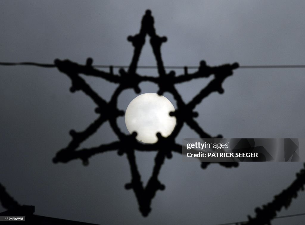 GERMANY-WEATHER-CHRISTMAS-SUN-FEATURE