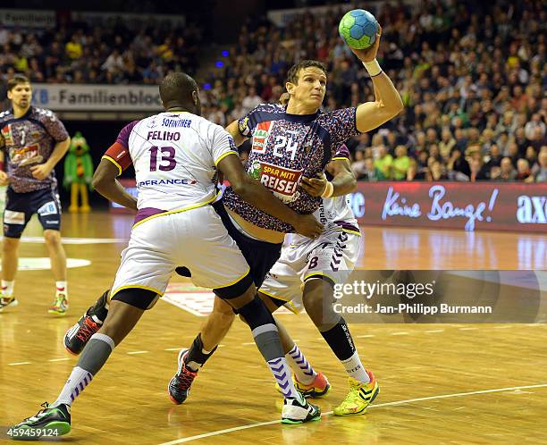 Rock Feliho of HBC Nantes and Bartlomiej Jaszka of Fuechse Berlin during the game between Fuechse Berlin and HBC Nantes on november 23, 2014 in...