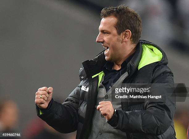 Markus Weinzierl, head coach of Augsburg celebrates during the Bundesliga match between VfB Stuttgart and FC Augsburg at Mercedes-Benz Arena on...