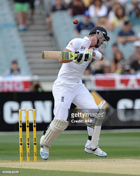 England's Keven Pietersen ducking away from a bouncer by Mitchell Johnson on the second day of the fourth Ashes cricket Test match against Australia...