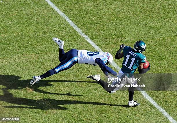 Josh Huff of the Philadelphia Eagles runs the ball for a touchdown against Ryan Succop of the Tennessee Titans in the first quarter of the game at...