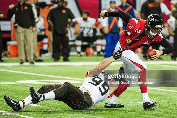 Paul Kruger of the Cleveland Browns sacks Matt Ryan of the Atlanta Falcons in the second half at Georgia Dome on November 23, 2014 in Atlanta,...