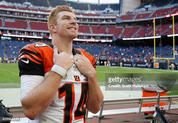 Andy Dalton of the Cincinnati Bengals looks up to his family in the stands after the Bengals defeated the Houston Texans 22-13 at NRG Stadium on...
