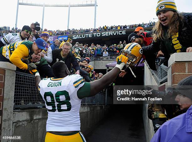 Letroy Guion of the Green Bay Packers celebrates a win of the game against the Minnesota Vikings on November 23, 2014 at TCF Bank Stadium in...