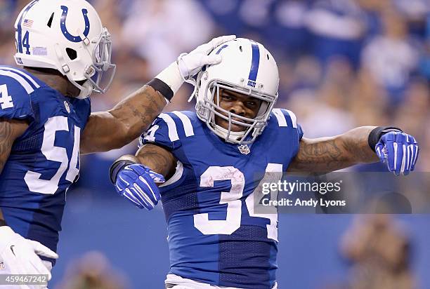 Trent Richardson of the Indianapolis Colts celebrates with Andrew Jackson after running for a touchdown during the game against the Jacksonville...