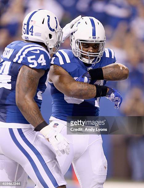 Trent Richardson of the Indianapolis Colts celebrates with Andrew Jackson after running for a touchdown during the game against the Jacksonville...