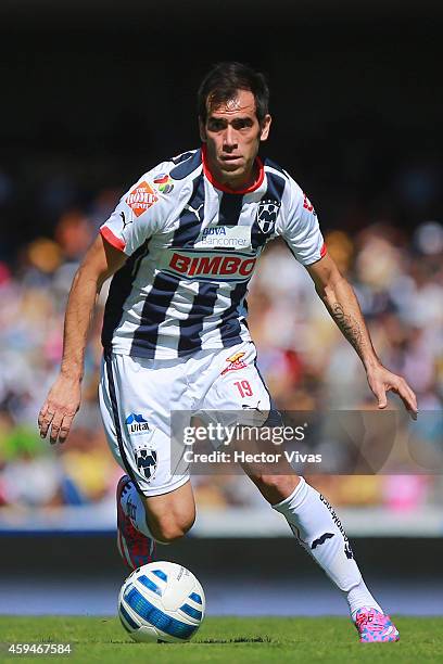 Cesar Delgado of Monterrey drives the ball during a match between Pumas UNAM and Monterrey as part of 17th round Apertura 2014 Liga MX at Olympic...