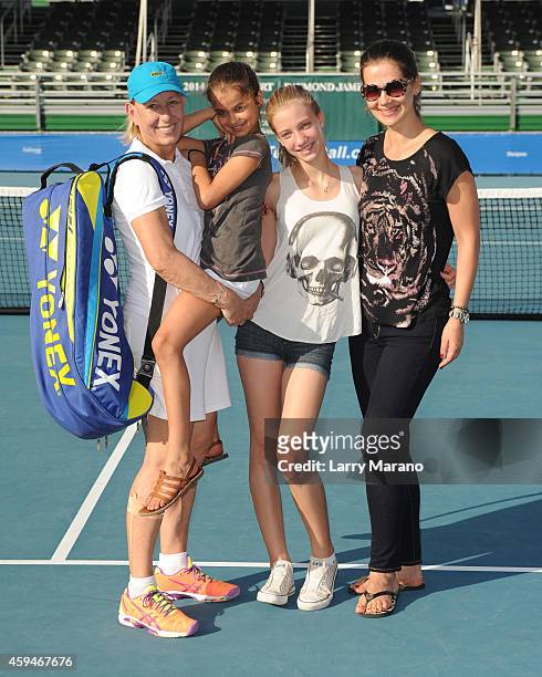 Martina Navratilova, Emma Navratilova, Victoria Navratilova and Julia Lemigova pose at the 25th Annual Chris Evert/Raymond James Pro-Celebrity Tennis...