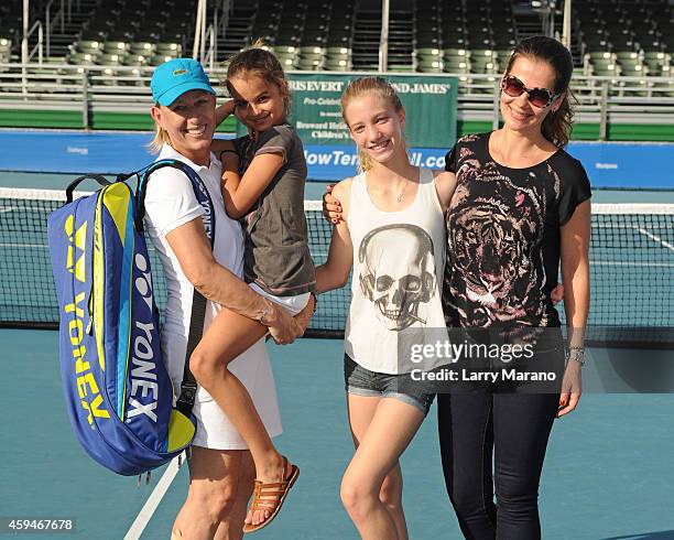 Martina Navratilova, Emma Navratilova, Victoria Navratilova and Julia Lemigova pose at the 25th Annual Chris Evert/Raymond James Pro-Celebrity Tennis...