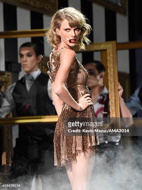 Taylor Swift performs onstage at the 2014 American Music Awards at Nokia Theatre L.A. Live on November 23, 2014 in Los Angeles, California.