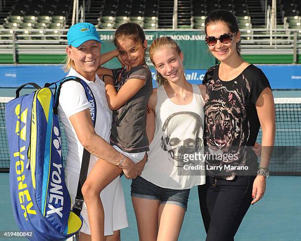 Martina Navratilova, Emma Navratilova, Victoria Navratilova and Julia Lemigova pose at the 25th Annual Chris Evert/Raymond James Pro-Celebrity Tennis...