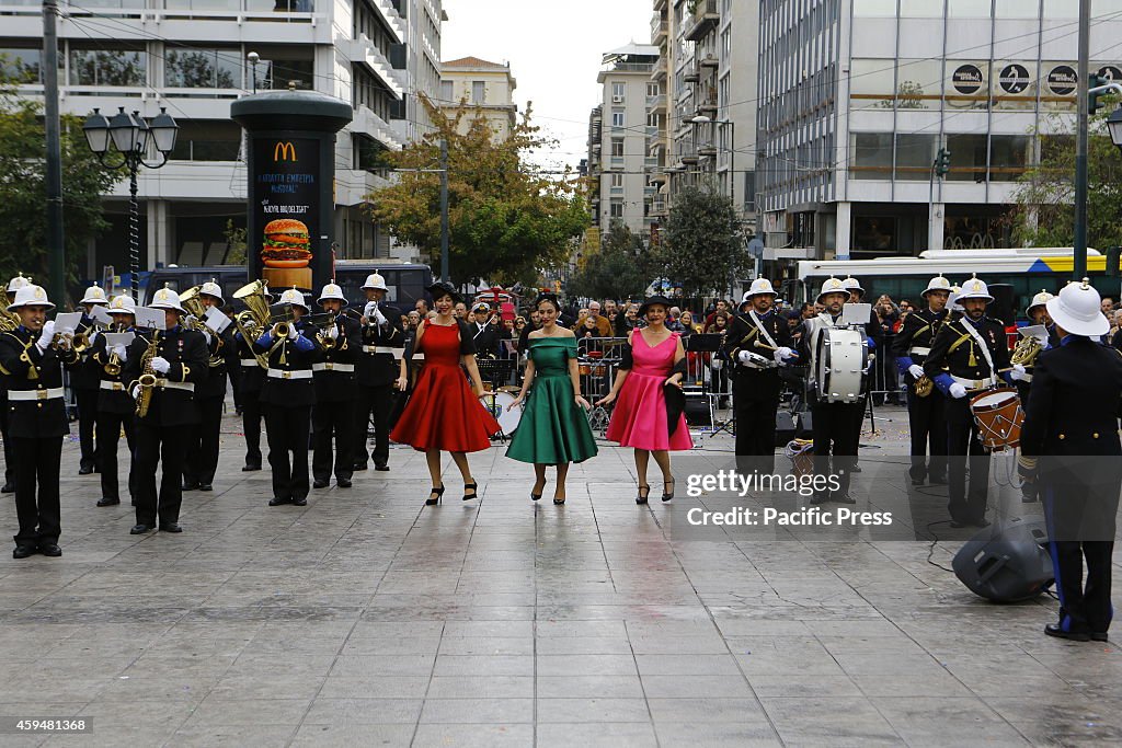 The Hellenic Navy Band and three female singers perform at...