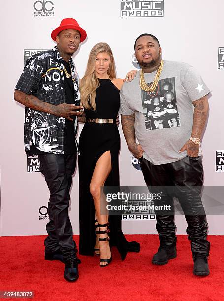Singer Fergie with YG and DJ Mustard attend the 2014 American Music Awards at Nokia Theatre L.A. Live on November 23, 2014 in Los Angeles, California.