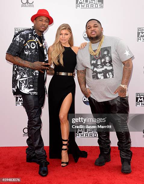 Singer Fergie with YG and DJ Mustard attend the 2014 American Music Awards at Nokia Theatre L.A. Live on November 23, 2014 in Los Angeles, California.