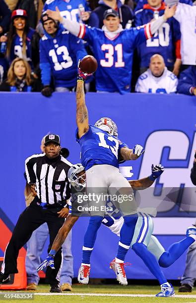 Odell Beckham of the New York Giants scores a touchdown in the second quarter against the Dallas Cowboys at MetLife Stadium on November 23, 2014 in...