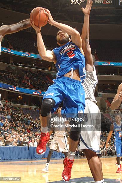 Jalen Cannon of the St. Francis Terriers drives to the basket during a college basketball game against the against the St. Francis Terriers at the...