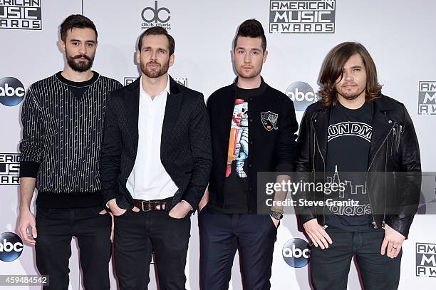 Musicians Kyle Simmons, William Farquarson, Dan Smith and Chris 'Woody' Wood of Bastille attend the 2014 American Music Awards at Nokia Theatre L.A....