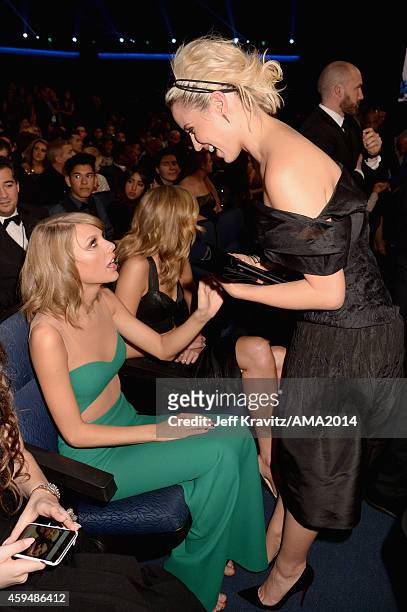 Singer Taylor Swift and actress Dianna Agron attend the 2014 American Music Awards at Nokia Theatre L.A. Live on November 23, 2014 in Los Angeles,...