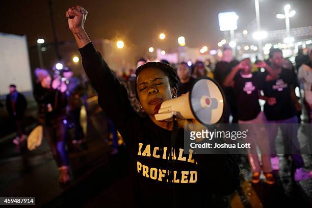 Demonstrators protest the shooting death of Michael Brown November 23, 2014 in St. Louis, Missouri. Brown, a 18-year-old black male teenager was...
