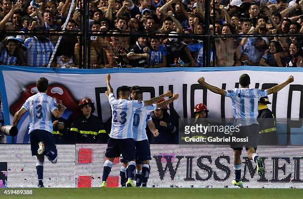 Ricardo Centurion of Racing Club and teammates celebrate the own goal converted by Ramiro Funes Mori of River Plate during a match between Racing...