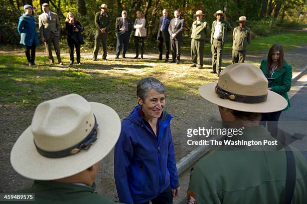 Secretary of the Interior Sally Jewell, center, speaks to National Park Service personnel at Belle Haven Marina following a press conference on the...