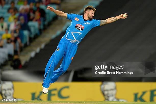 Kane Richardson of the Strikers catches the ball during the Big Bash League match between Sydney Thunder and the Adelaide Strikers at ANZ Stadium on...