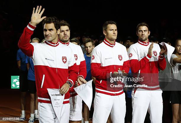 Roger Federer, Stan Wawrinka, Marco Chiudinelli, Michael Lammer of Switzerland pose during the team presentation on day one of the Davis Cup tennis...